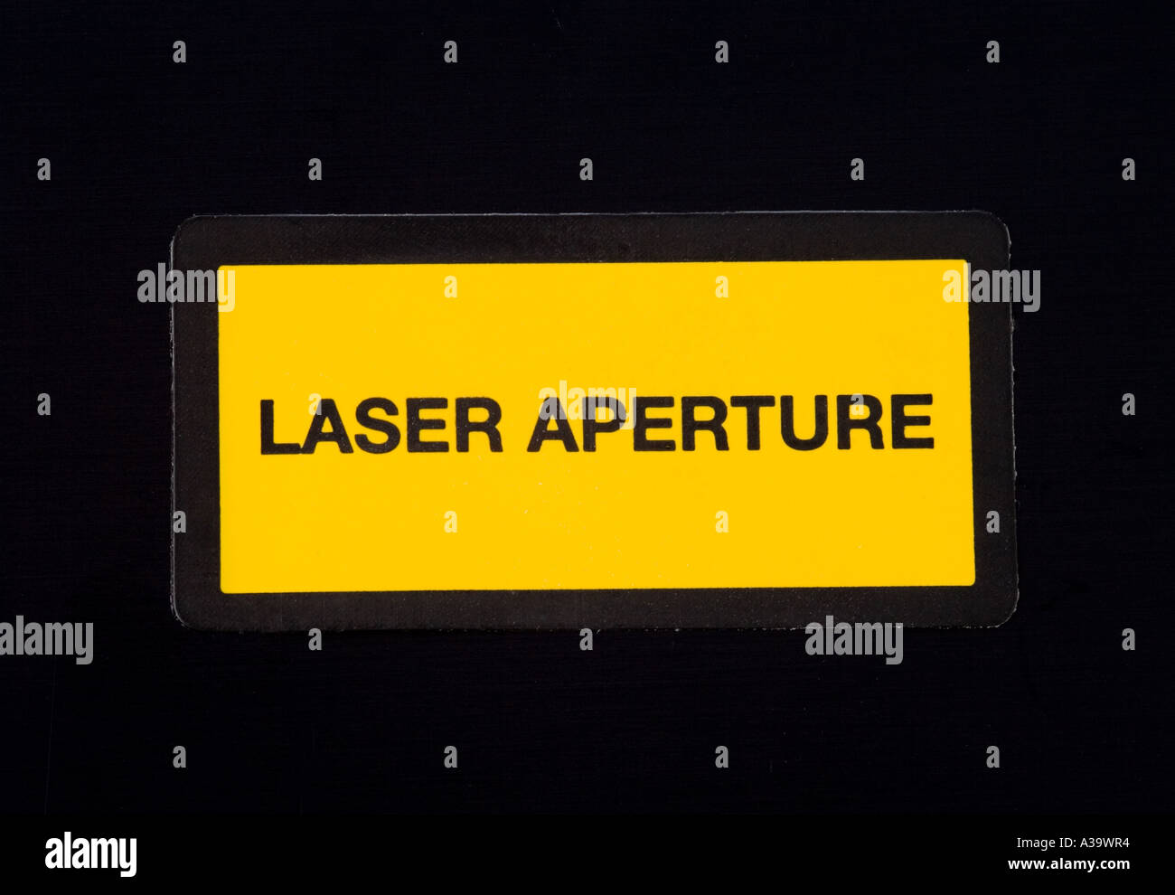 Ouverture du laser de l'étiquette d'avertissement Banque D'Images