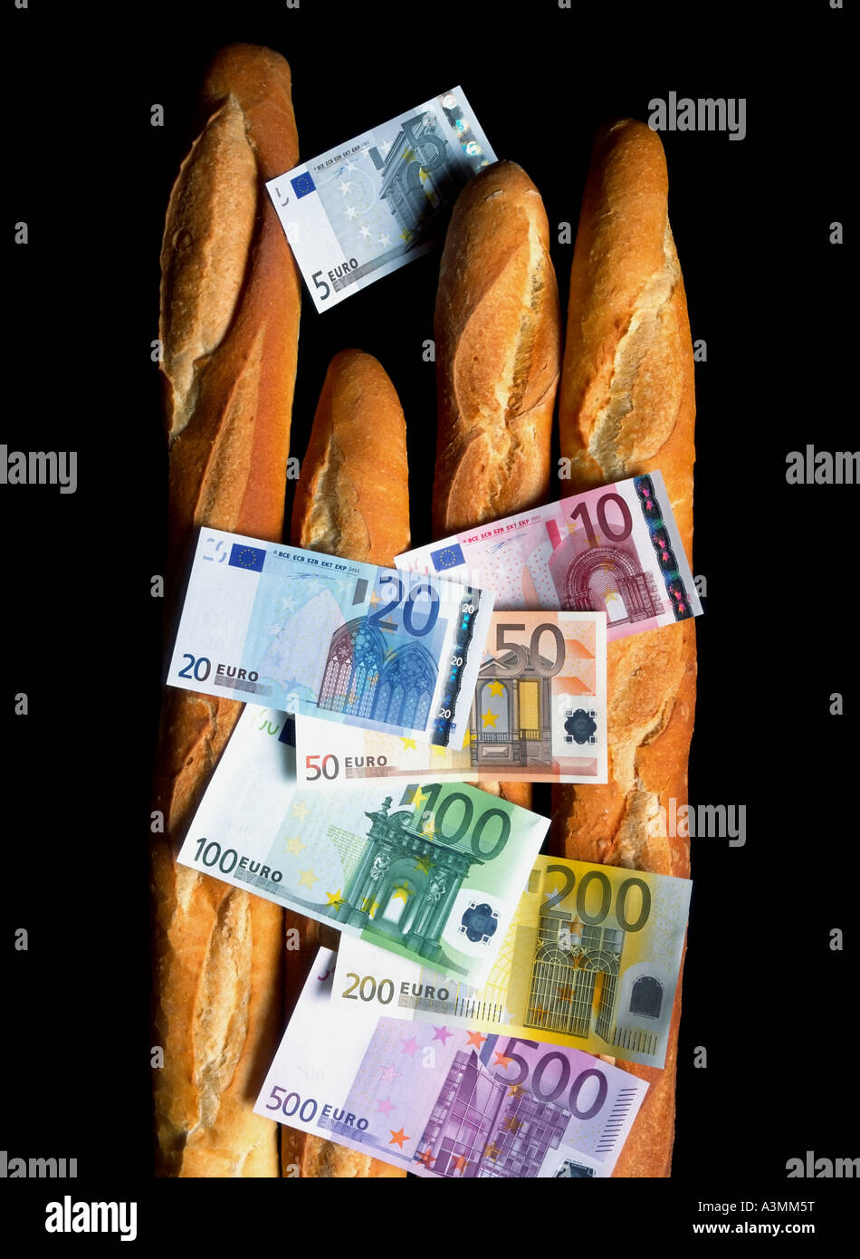 BILLETS EN EUROS SUR DES BAGUETTES FRANÇAISES Banque D'Images