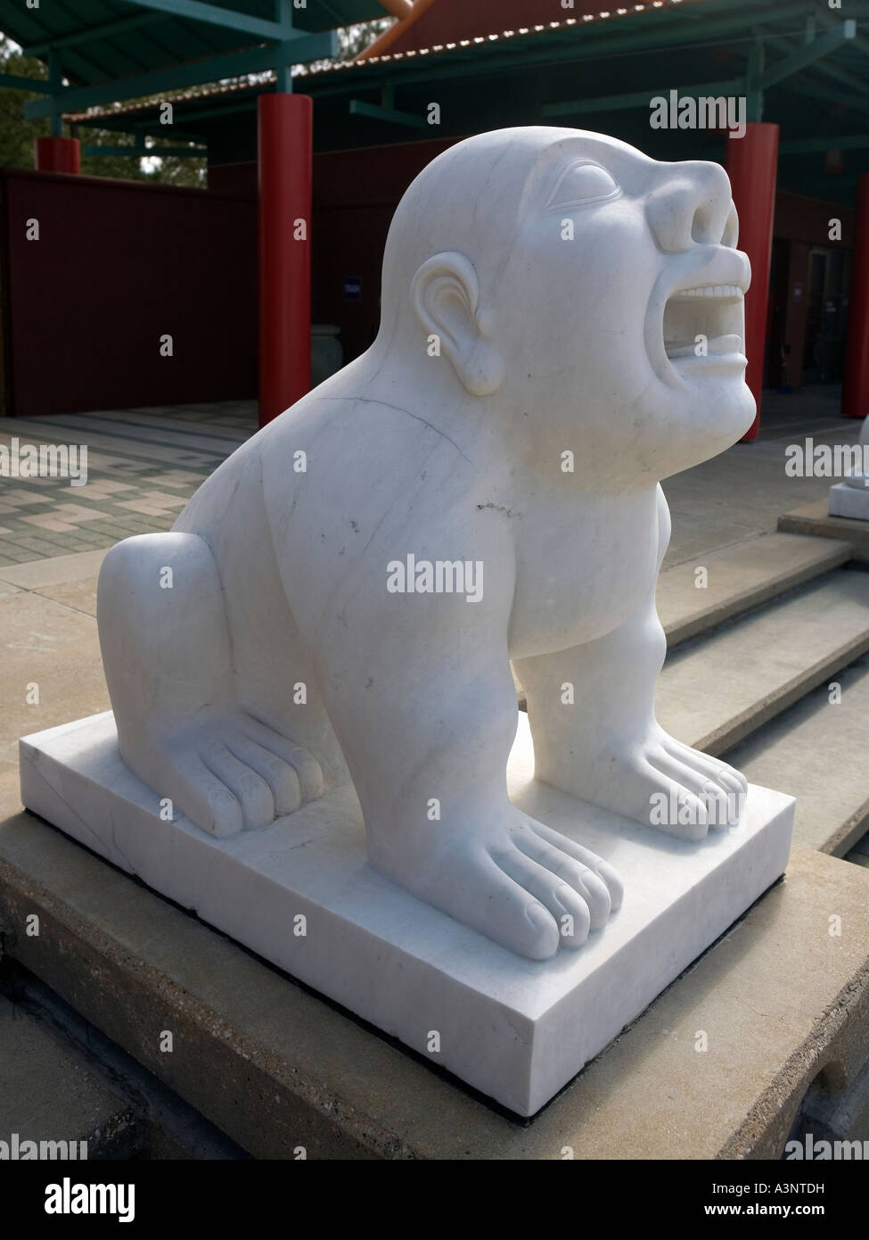 Sculptures chinoises représentant un chien avec la tête d'un homme Banque D'Images