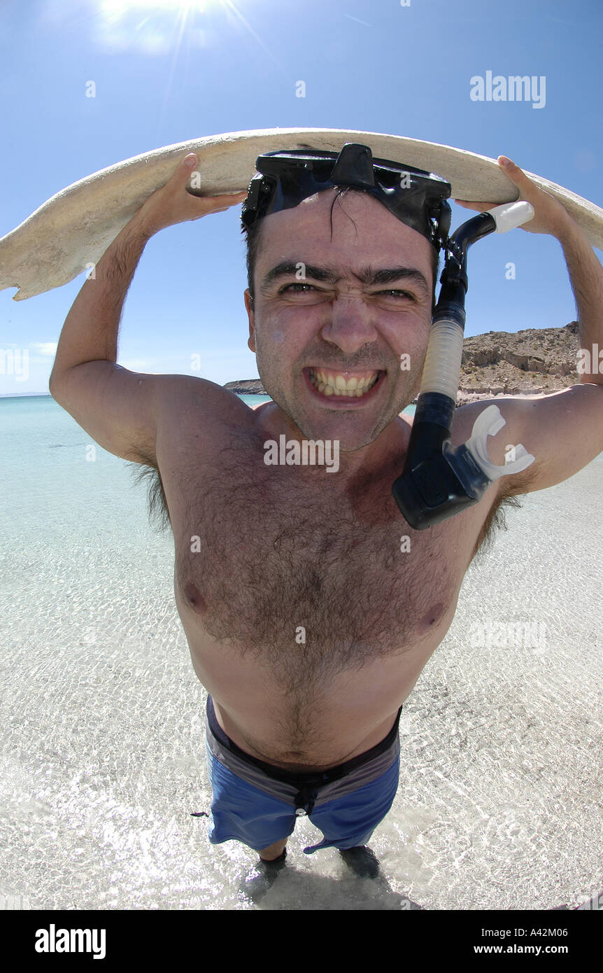 Jeune homme espagnol M. snorkeler-photographe avec son appareil photo et d'un rorqual à bosse osseuse vertèbre Espiri Banque D'Images