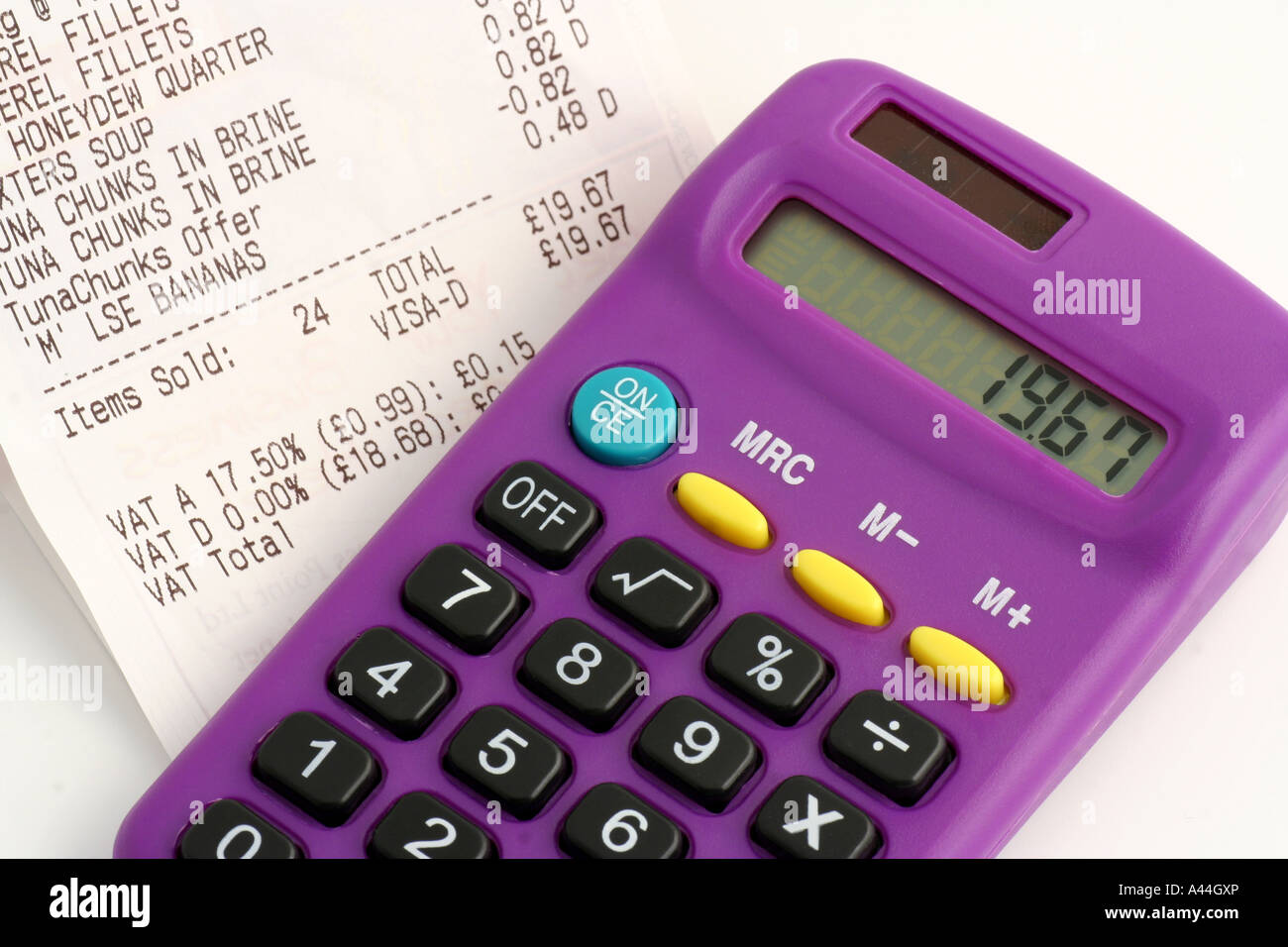 Calculatrice de poche et votre ticket de caisse Photo Stock - Alamy
