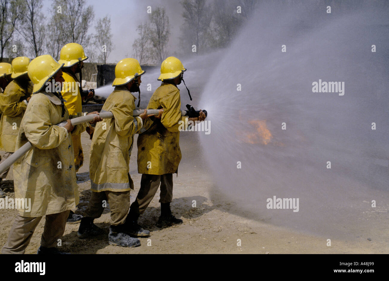 Formation Équipe de lutte contre l'incendie pendant la guerre du Golfe en Arabie saoudite Banque D'Images