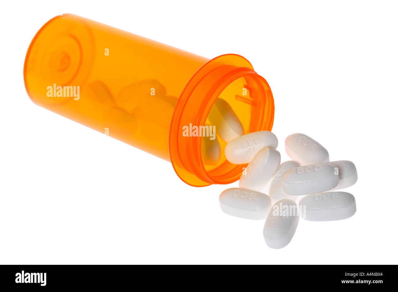 Bouteille de pilules avec pills spilling out Banque D'Images