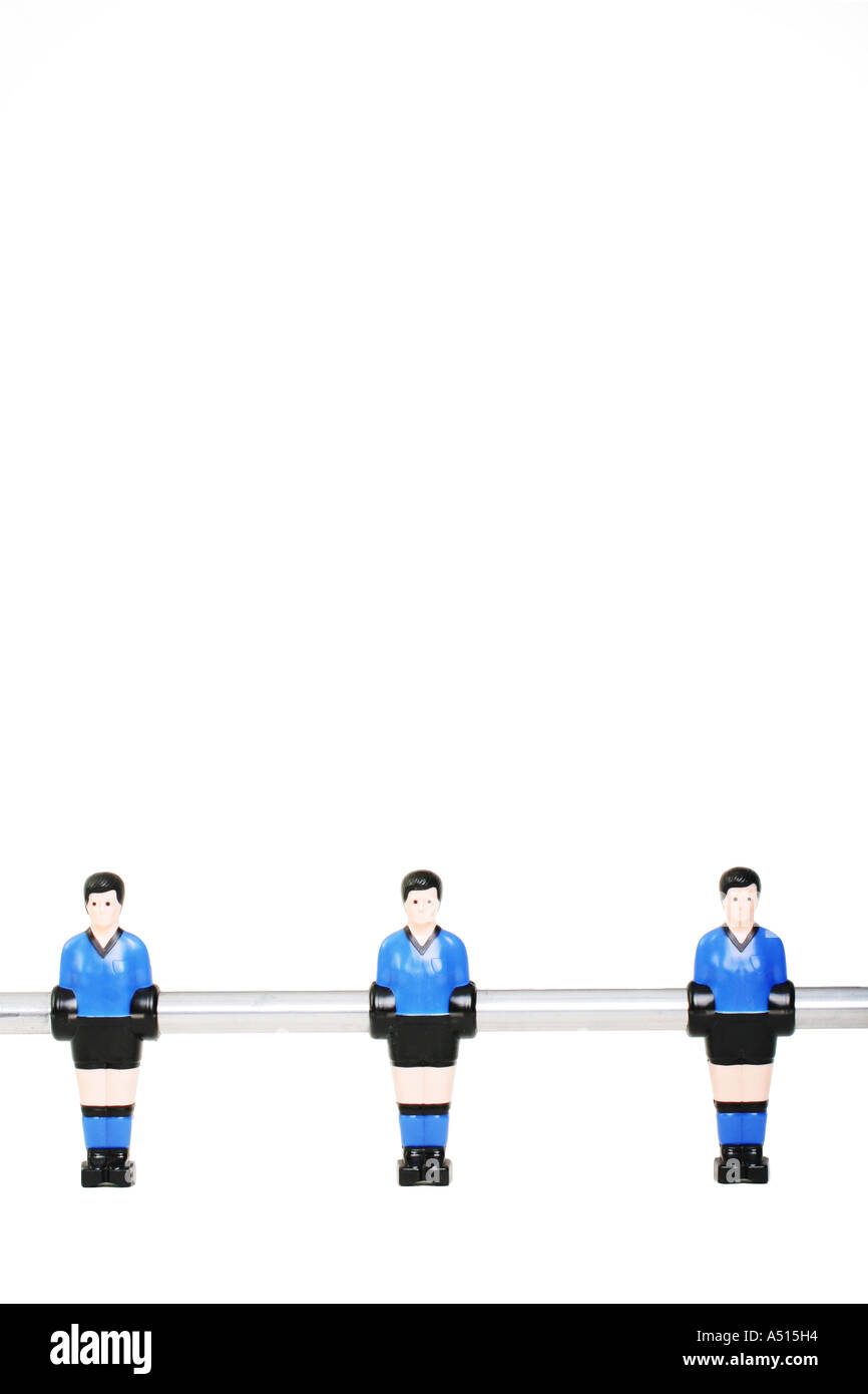 Trois joueurs de football un jeu de football de table. Banque D'Images