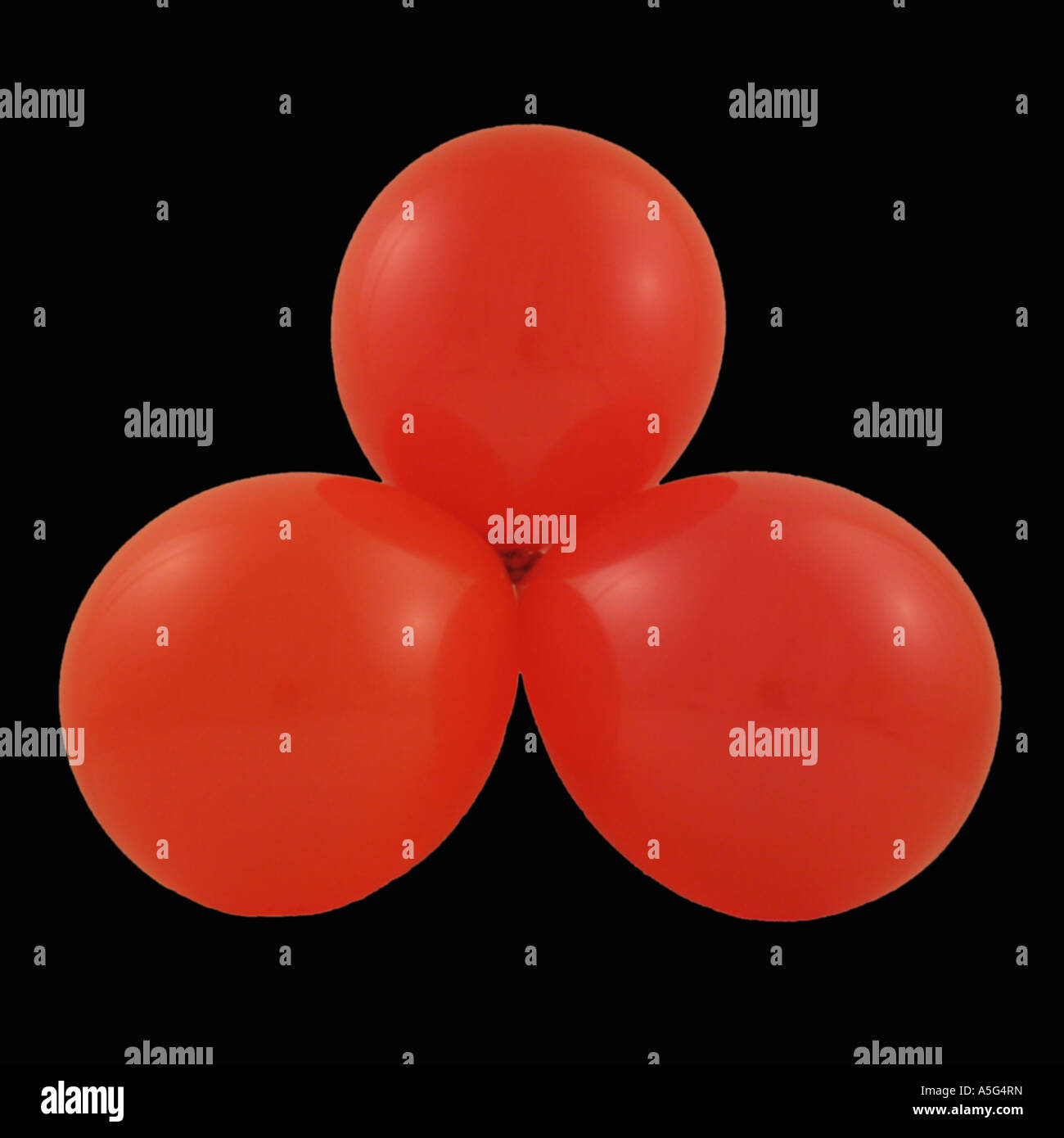 Trois ballons attachés ensemble représentant molécule en forme triangulaire plane Banque D'Images