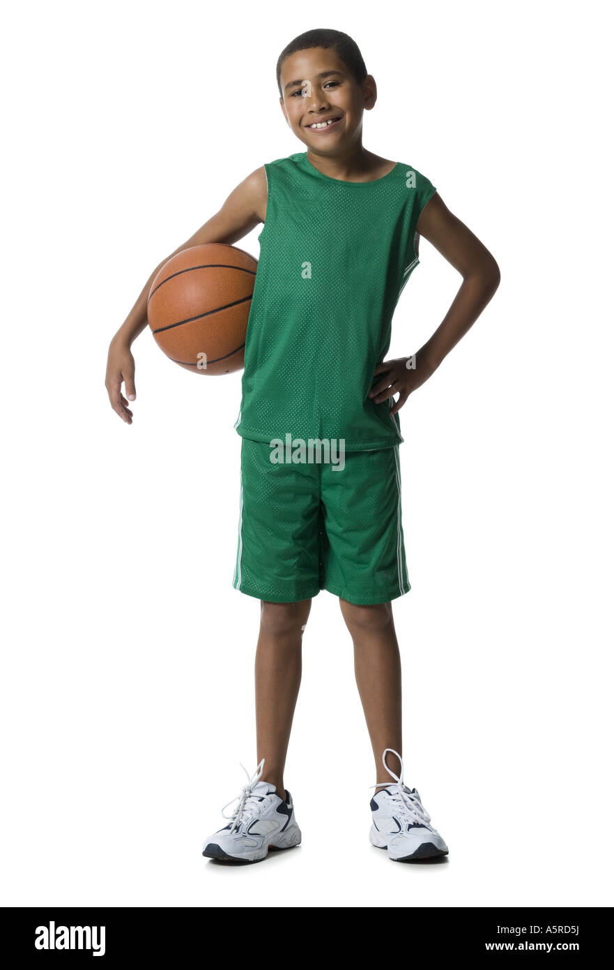 Portrait of a Boy holding a basket-ball Banque D'Images