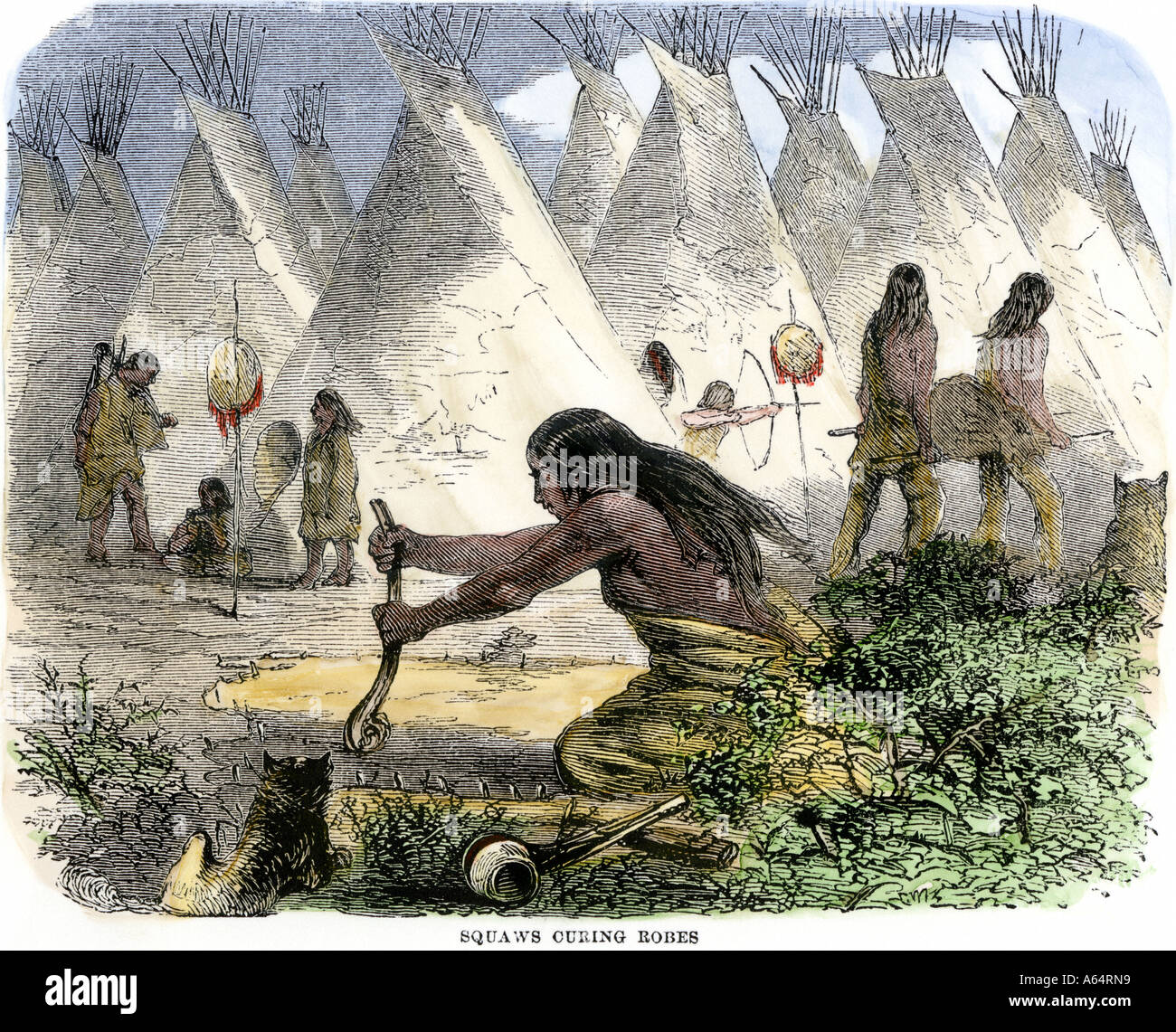 Les femmes autochtones curing buffalo se cache dans un village de tipis. À la main, gravure sur bois Banque D'Images