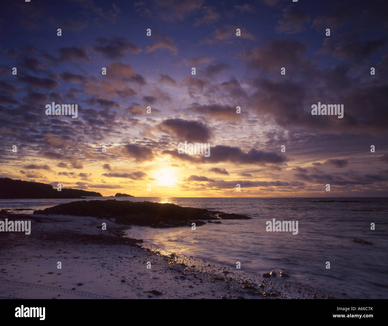 Coucher de soleil depuis la rive ouest d'Iona, Inner Hebrides Banque D'Images