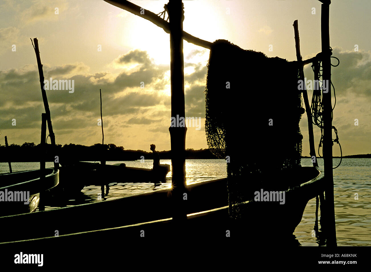 Bateau de pêche en bois et des filets Ambergris Caye Belize Banque D'Images