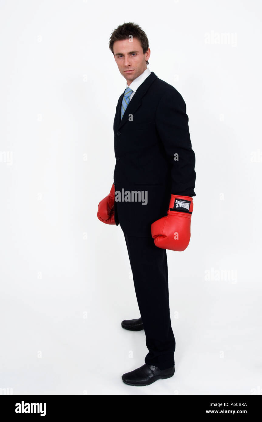Businessman avec des gants de boxe Boxing clever la gestion de la colère Banque D'Images