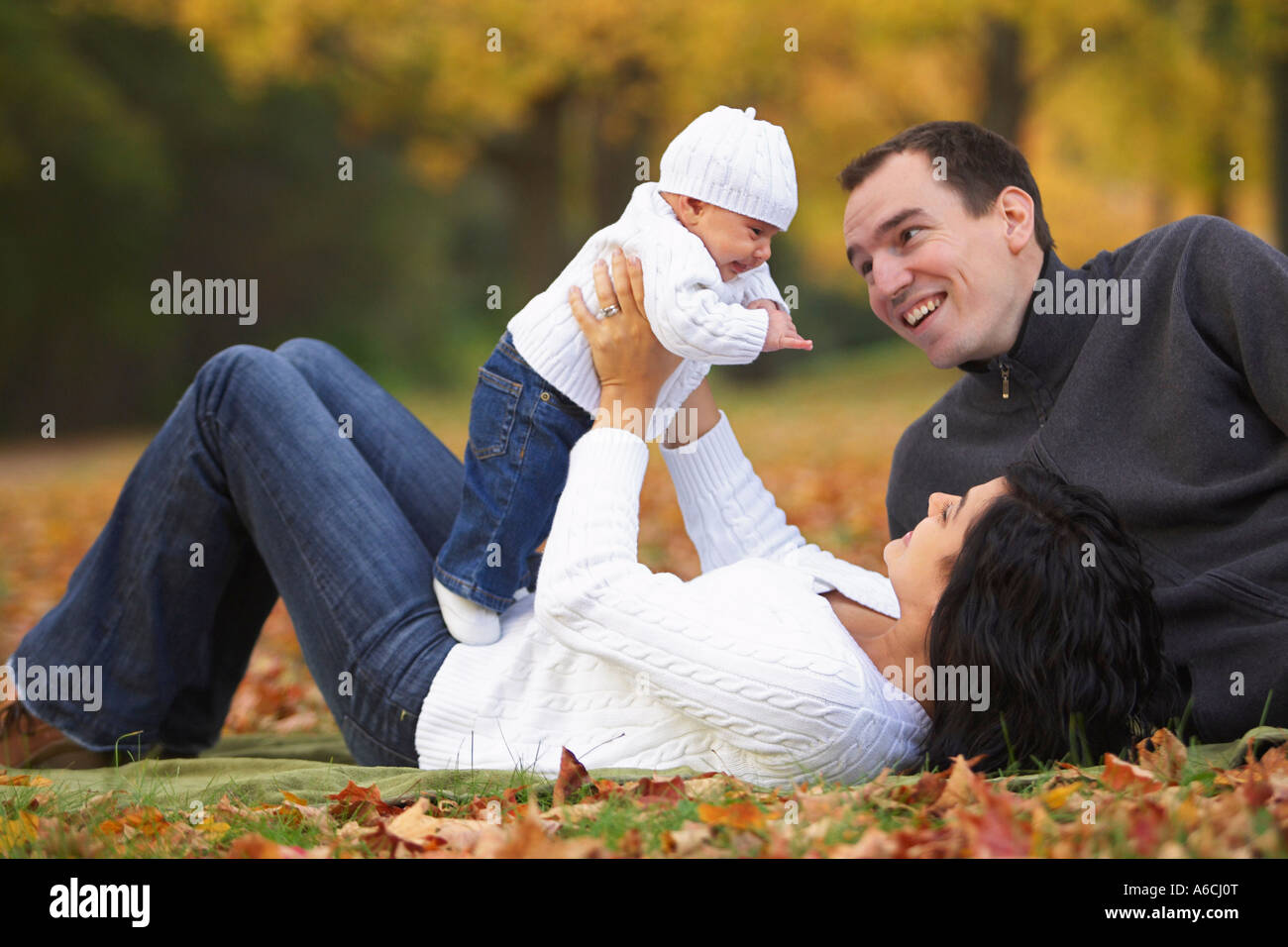 Famille au parc Banque D'Images