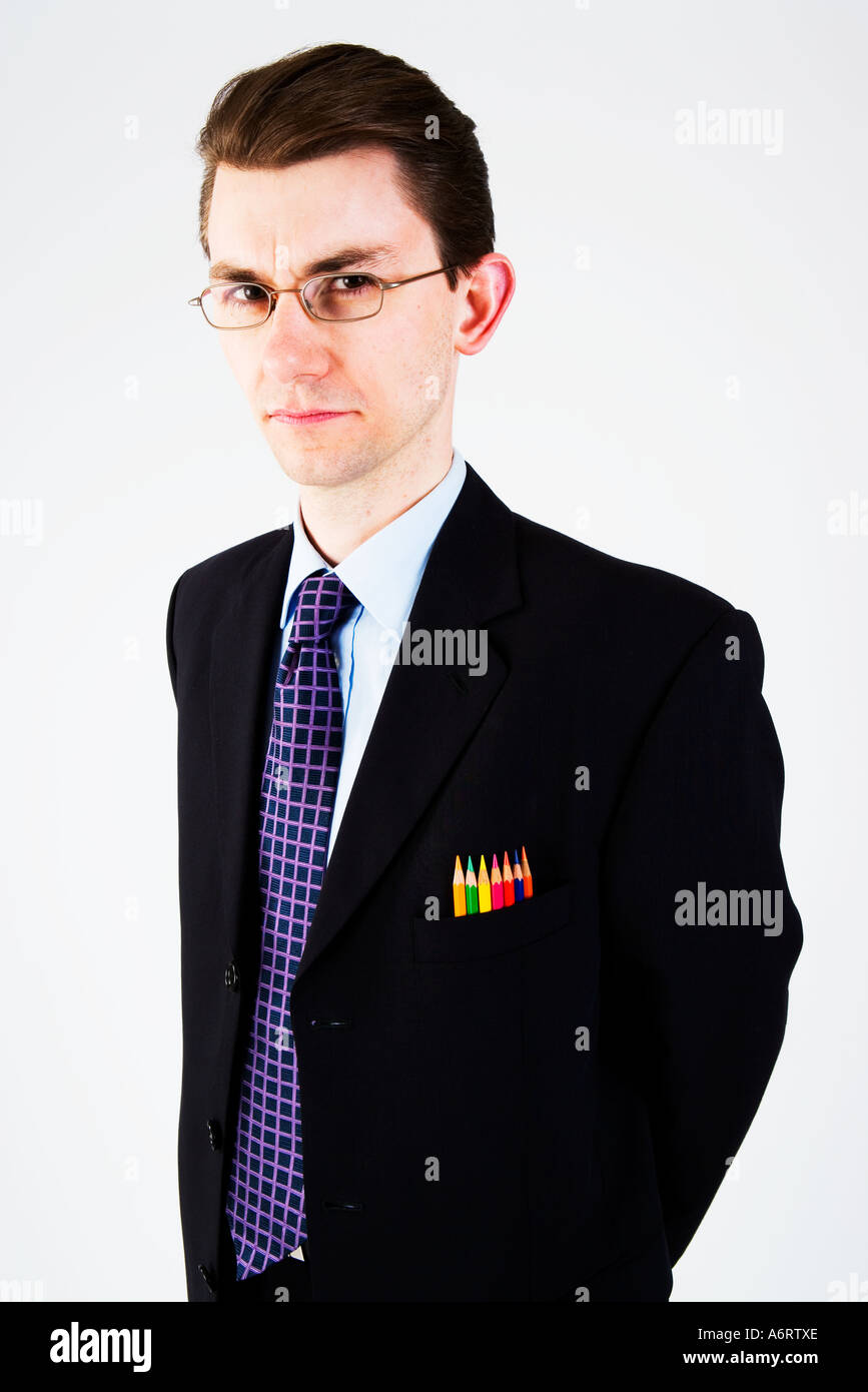 L'homme d'affaires en costume sombre avec des crayons dans sa poche de poitrine Banque D'Images