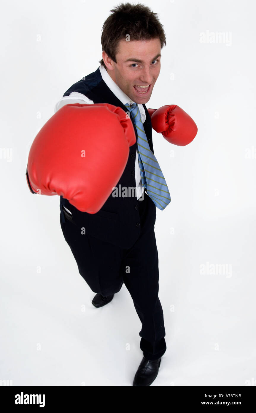 Businessman with boxing gloves Banque D'Images