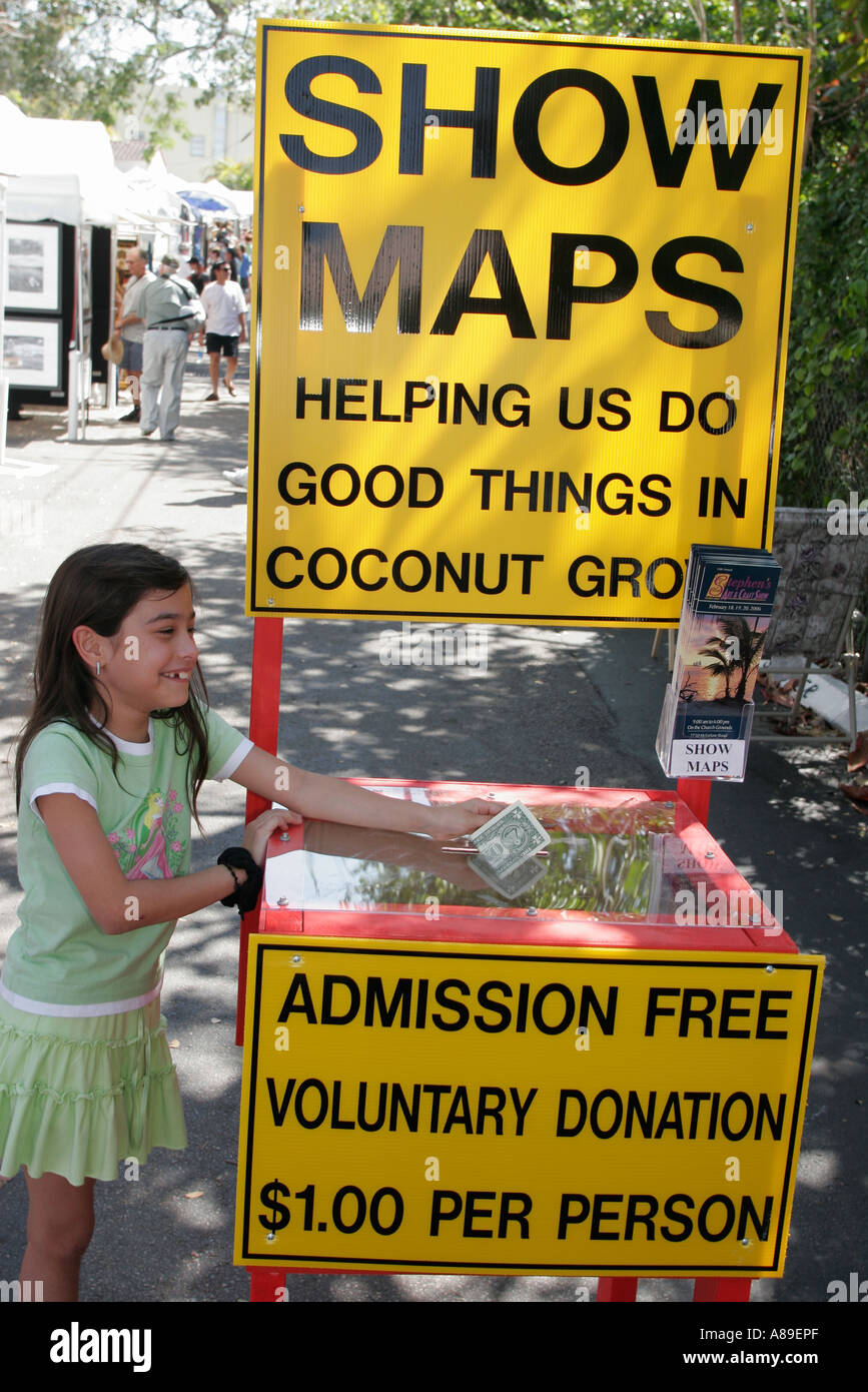 Miami Florida,Coconut Grove Arts Festival,foire aux festivals,entrée gratuite,don volontaire,afficher les cartes,filles hispaniques,jeune,enfants enfants childre Banque D'Images