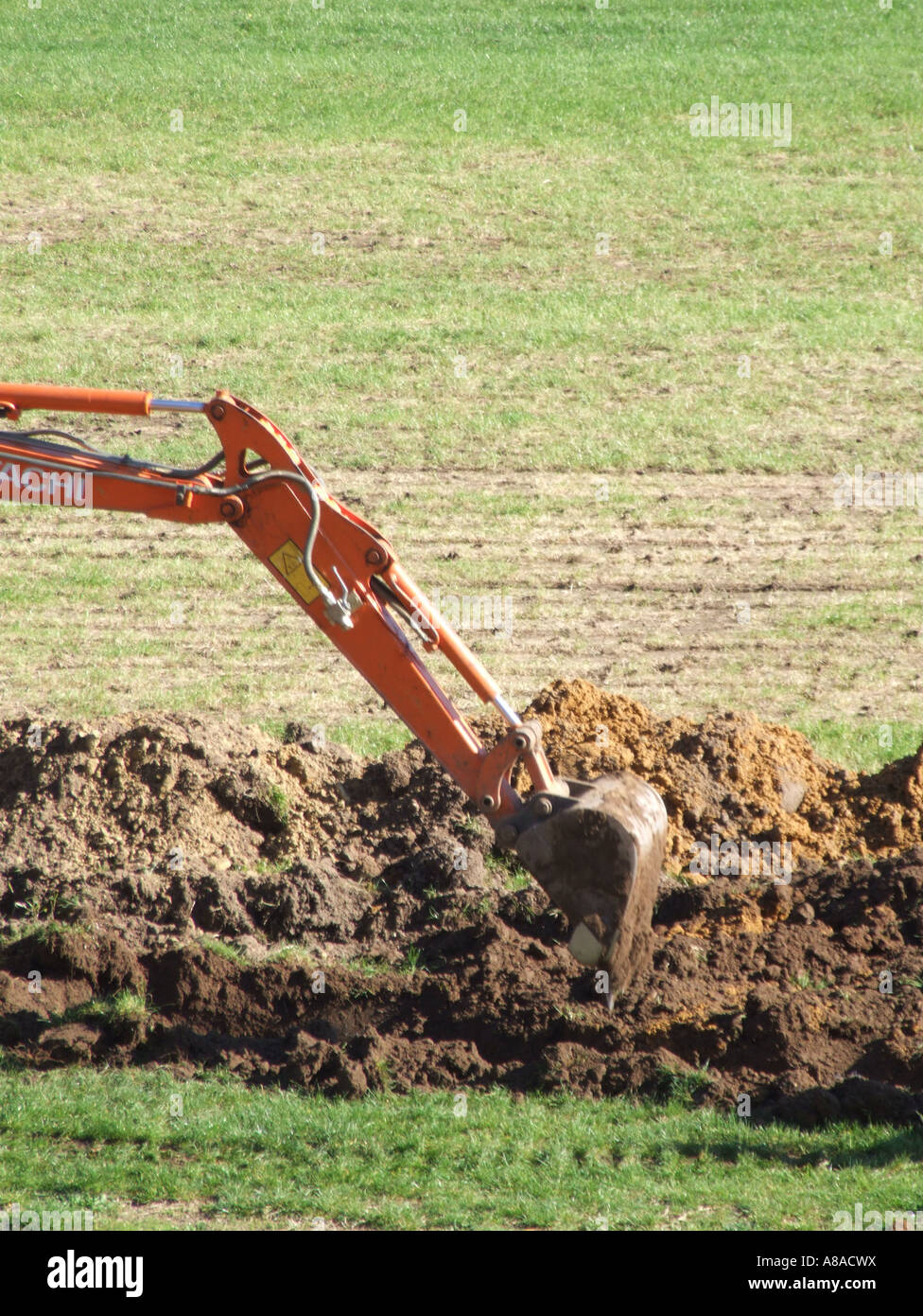 Mechanical digger trou creuser Banque D'Images
