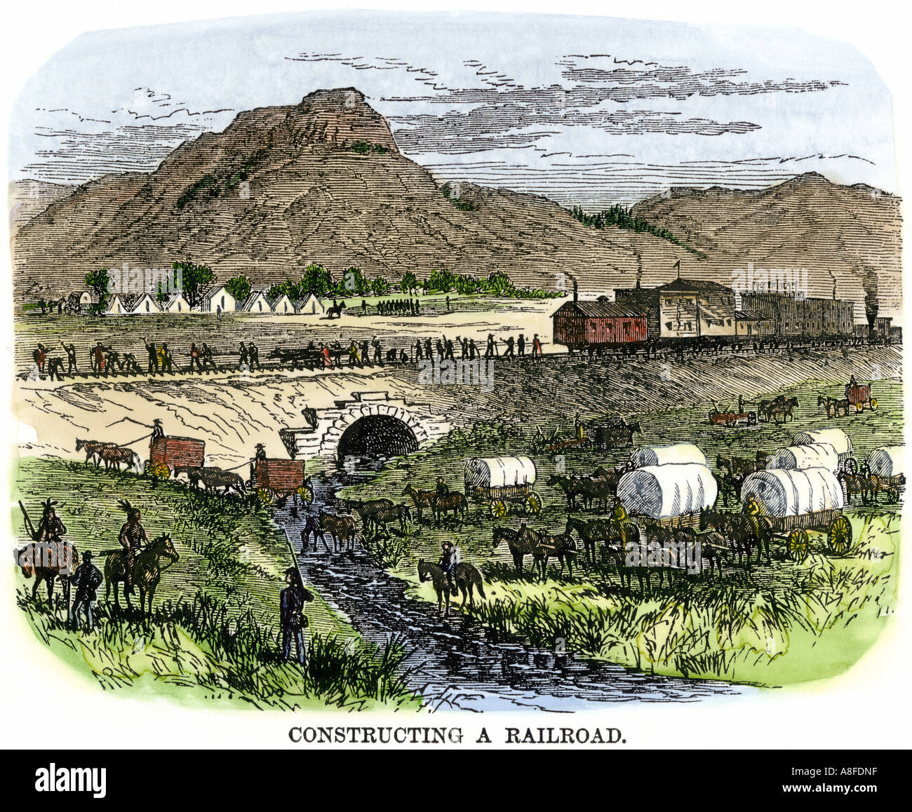 Les travailleurs du chemin de fer transcontinental et la construction d'un camp sur l'ouest des années 1800. À la main, gravure sur bois Banque D'Images