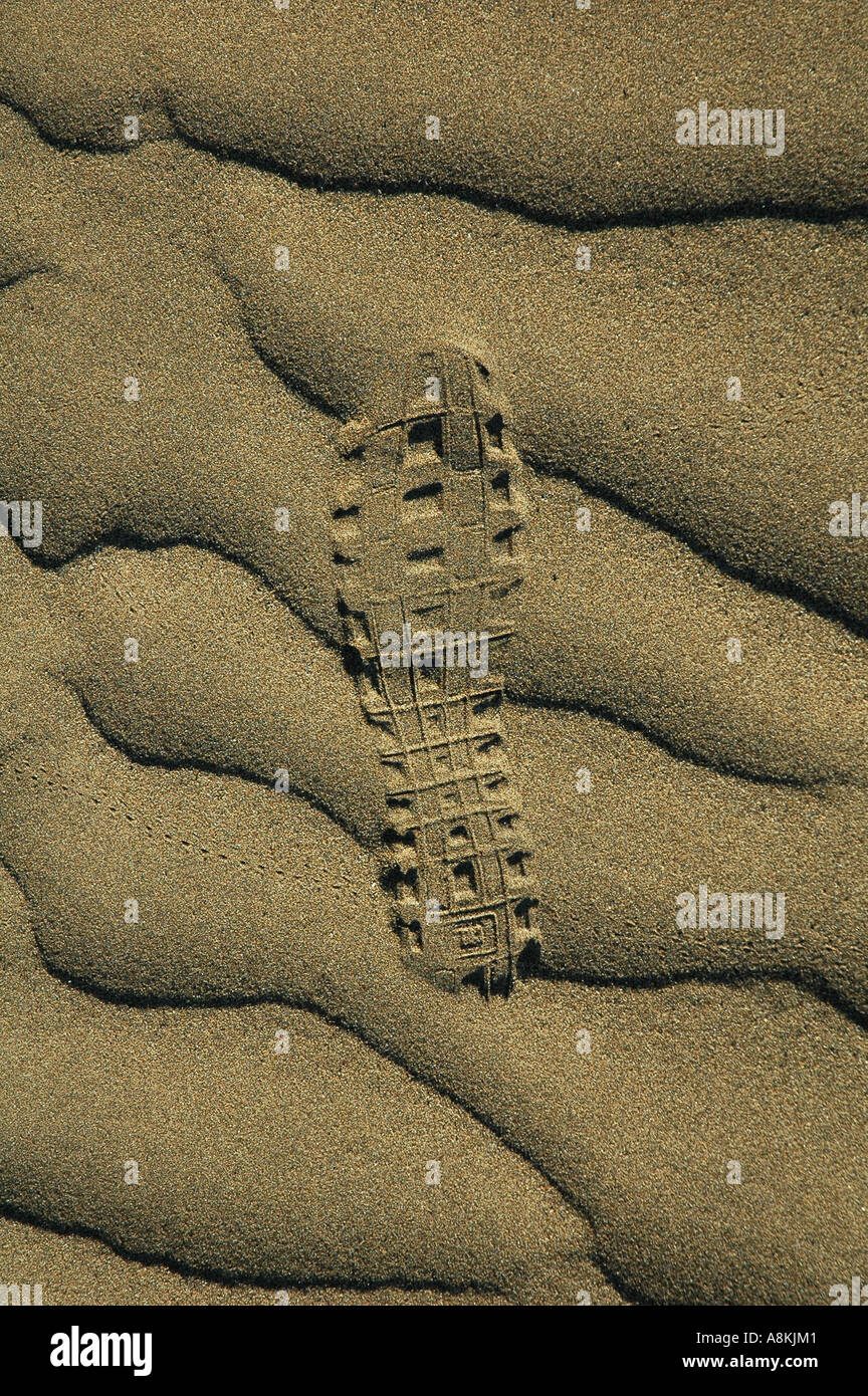 Shoeprint marquait sur désert de sable dune Banque D'Images