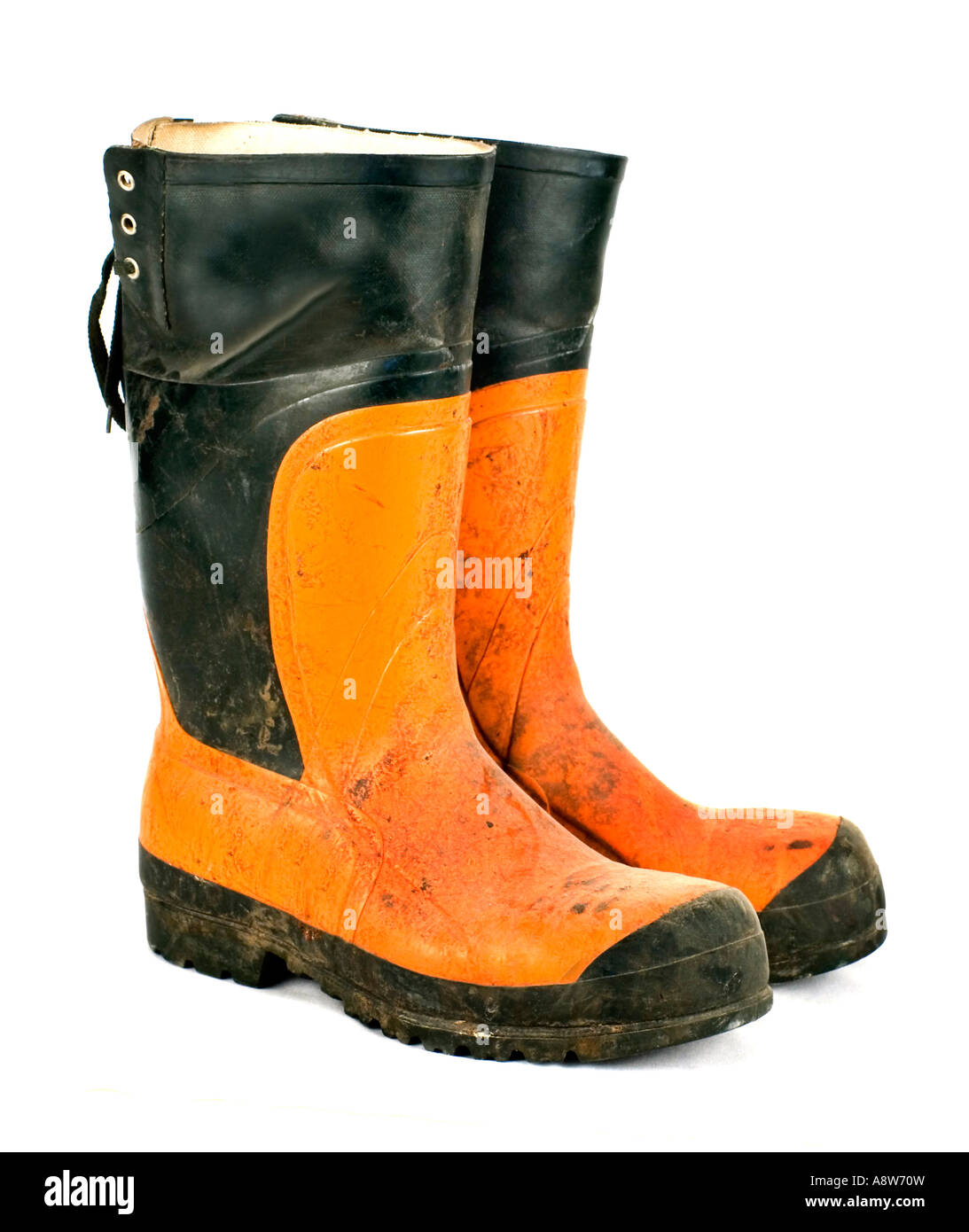 Bottes en caoutchouc travailleurs sur fond blanc Banque D'Images