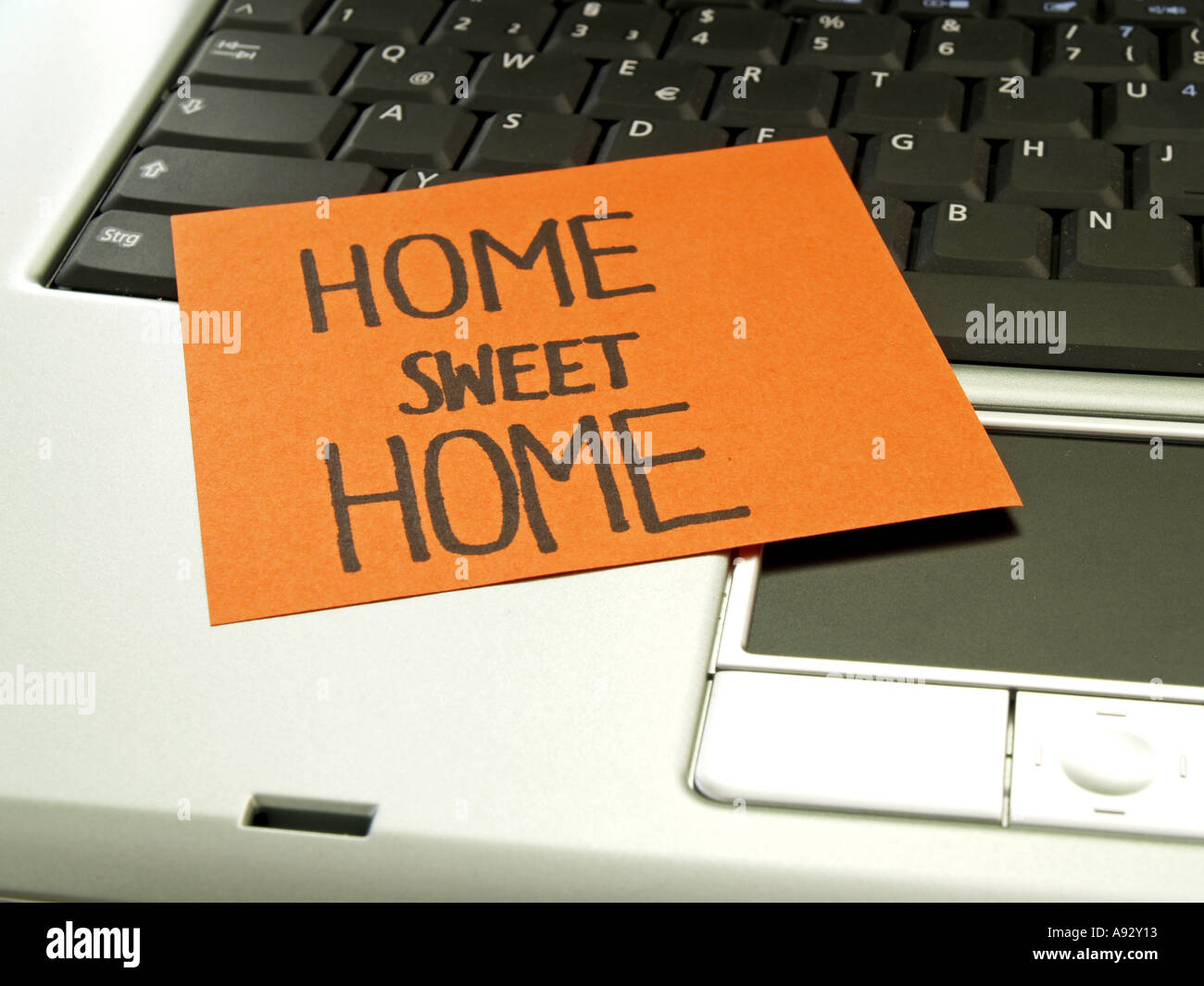 Memo note sur l'ordinateur portable, home sweet home Banque D'Images
