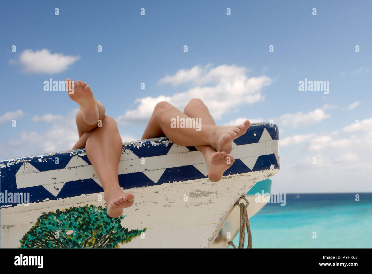 Les jambes pendantes de bateau de pêche sur la plage de Playa Chen Rio côté est Cozumel mexique Banque D'Images