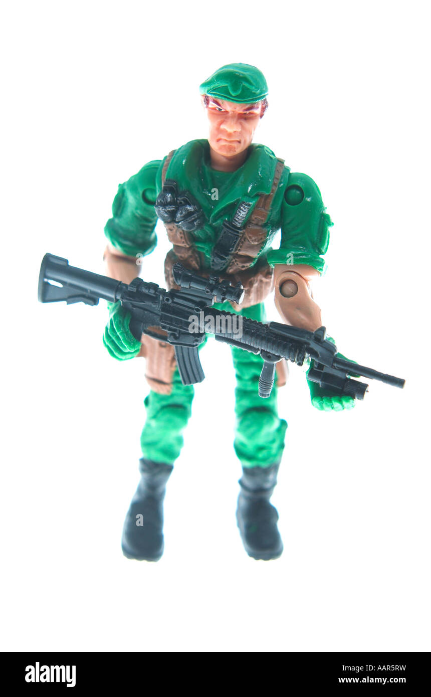 Soldat miniature jouet avec carabine automatique fusil fatigues beret boots prêts à l'assaut Banque D'Images