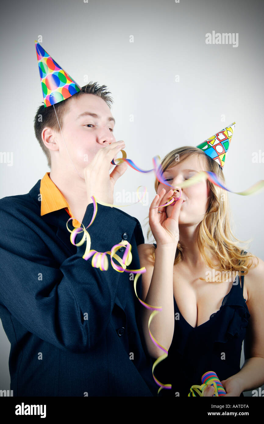 Young couple having fun at a party Banque D'Images