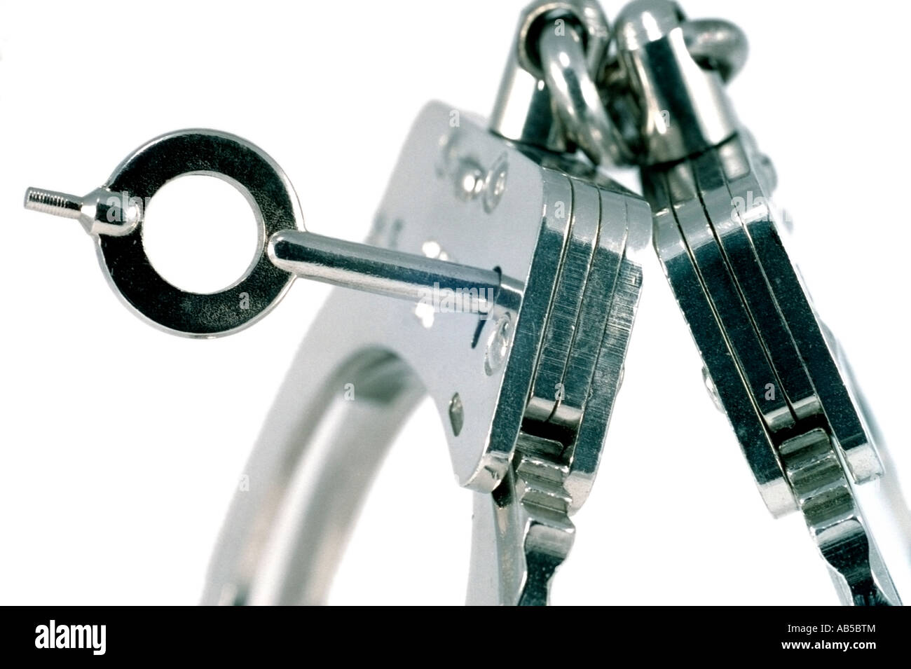 Close up de menottes et clé 3 Banque D'Images