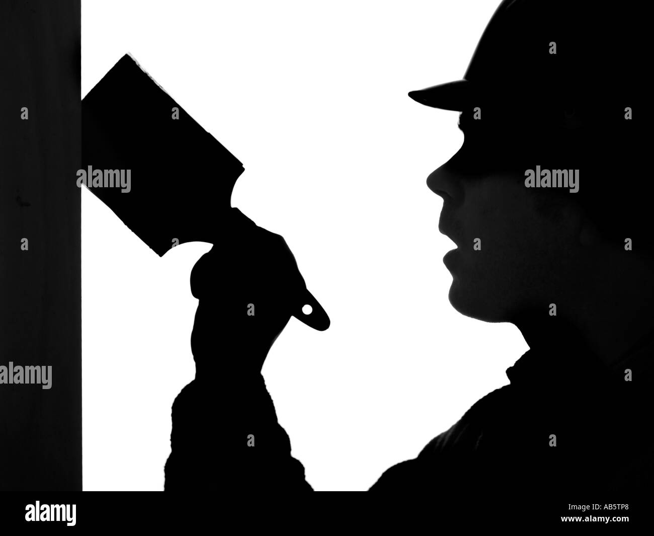 Silhouette de builder en casque peinture Banque D'Images