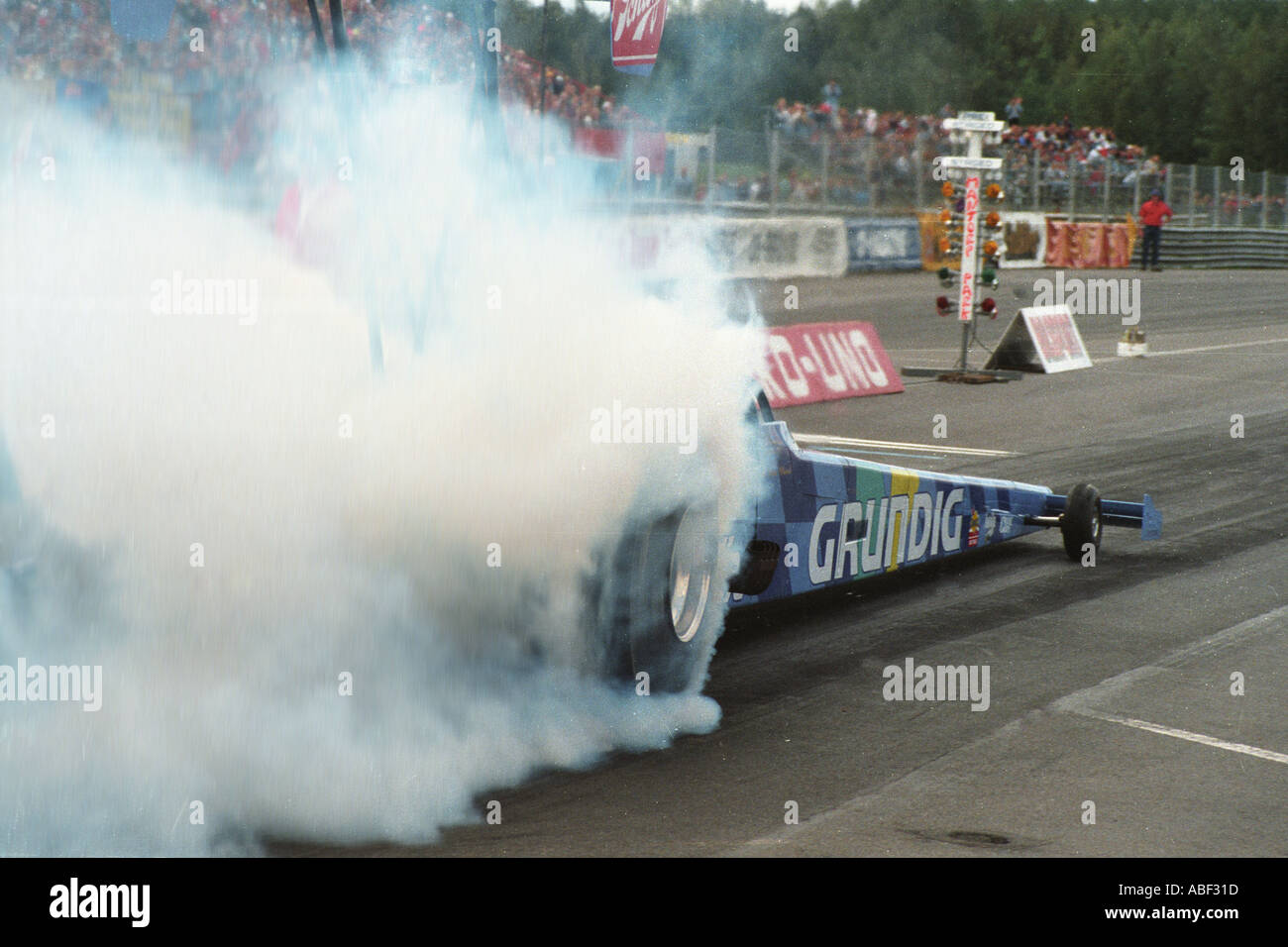 La combustion de carburant topr dragster avant course Banque D'Images