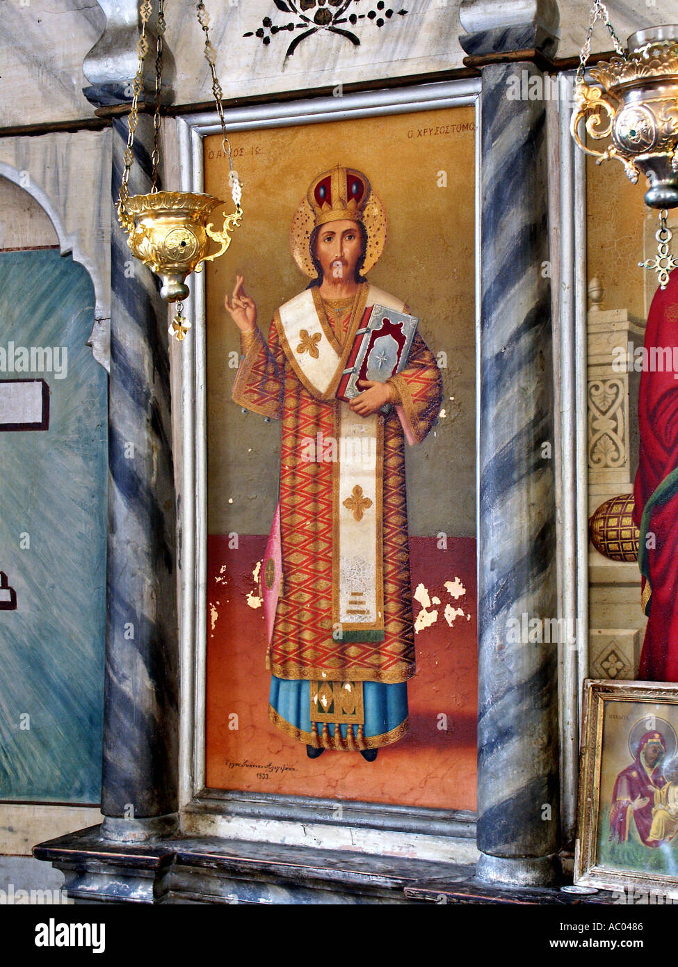 Saint Xrysostomos maintenant Holly book illustration murale ancienne église des sentiers à Tissiniva Crete island Grèce Banque D'Images