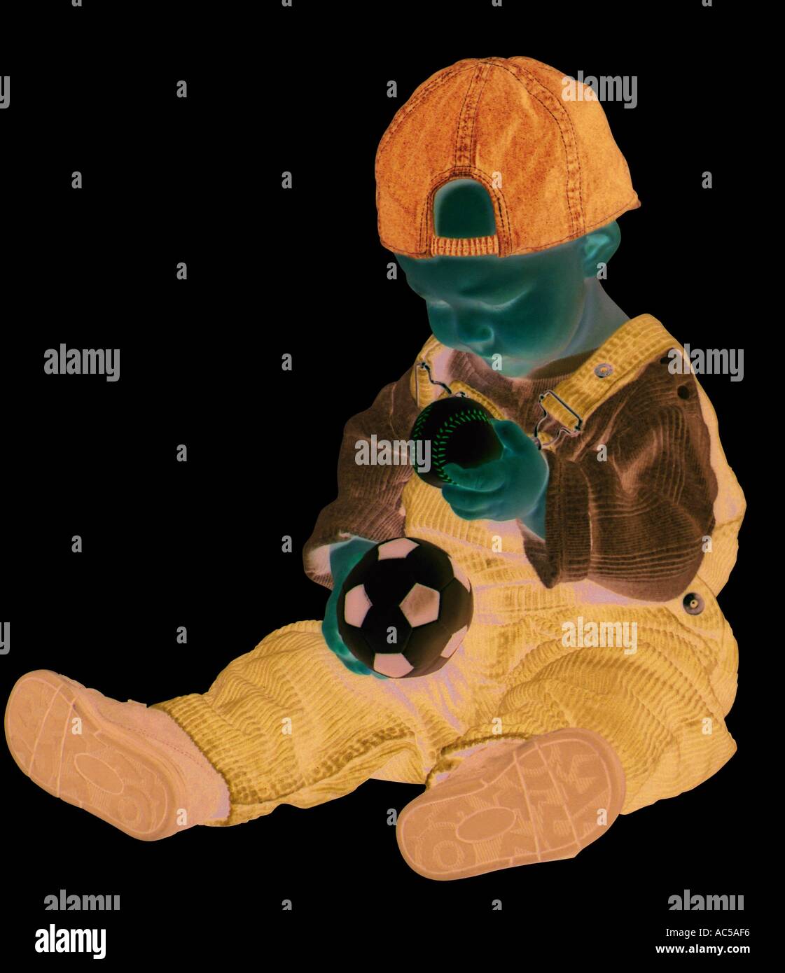 Les gens baby boy avec mini-foot jpg baby boy avec mini-foot jpg personne Banque D'Images