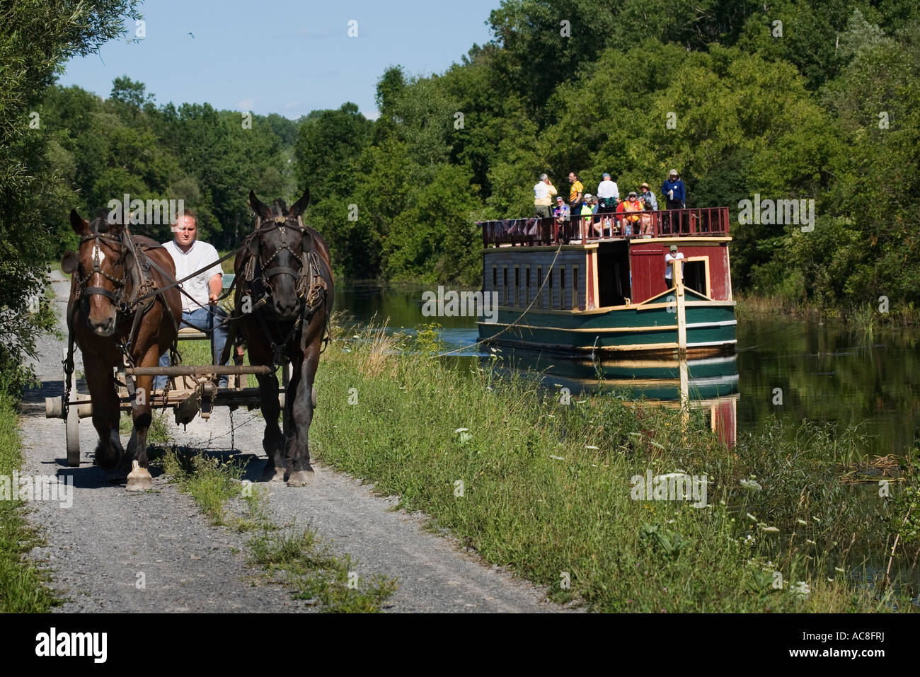 Chevaux tirant packet boat Erie Canal Village Rome New York Oneida Comté Banque D'Images