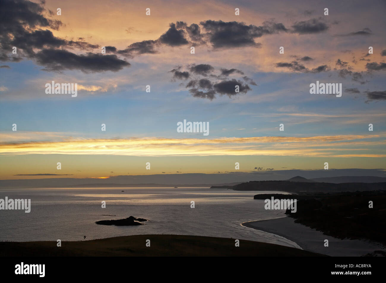 Coucher de soleil sur l'océan Pacifique Dunedin ile sud Nouvelle Zelande Banque D'Images