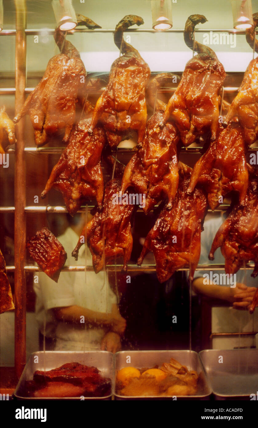 Volailles rôties pendaison dans fenêtre de Chinese Restaurant Londres Banque D'Images