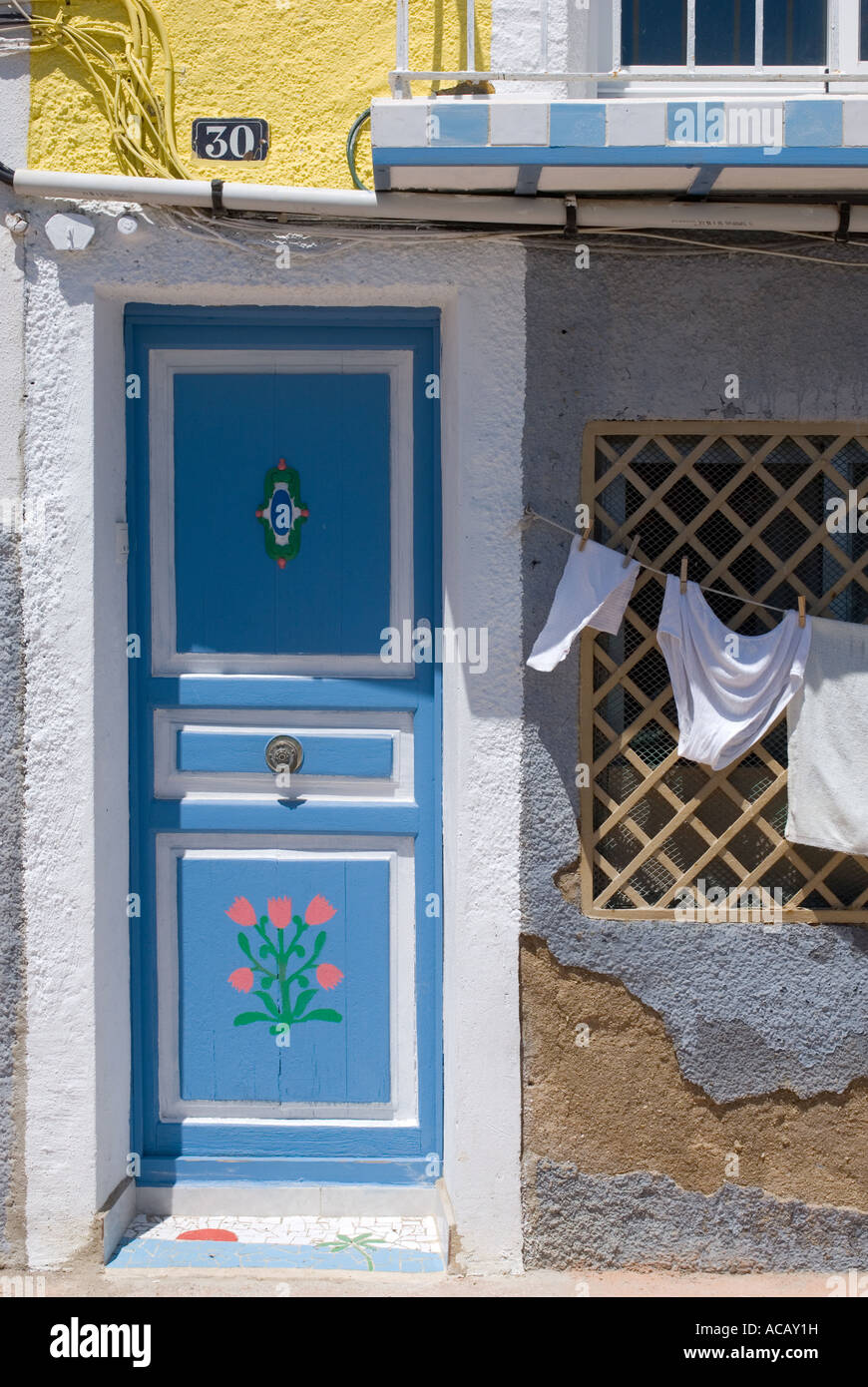 Maisons peintes de couleurs vives à Villajoyosa Costa Blanca Espagne Banque D'Images