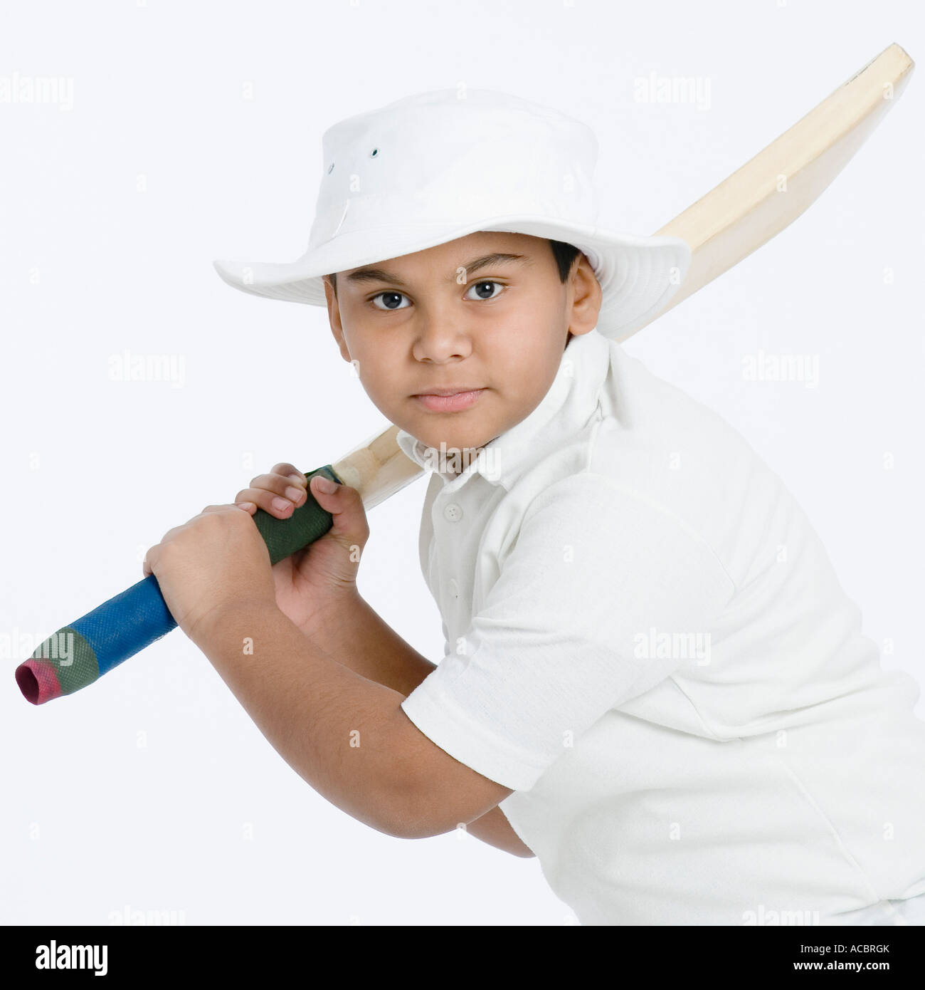 Portrait of a Boy holding a cricket Banque D'Images