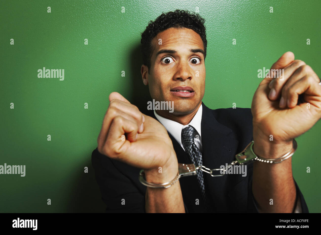 Businessman in handcuffs Banque D'Images