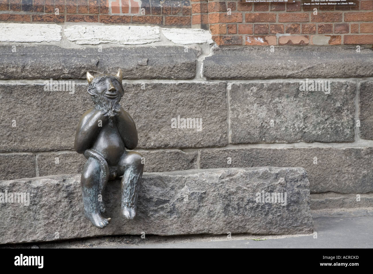 Chauds petit diable Statue Marienkirche Lübeck Allemagne Banque D'Images