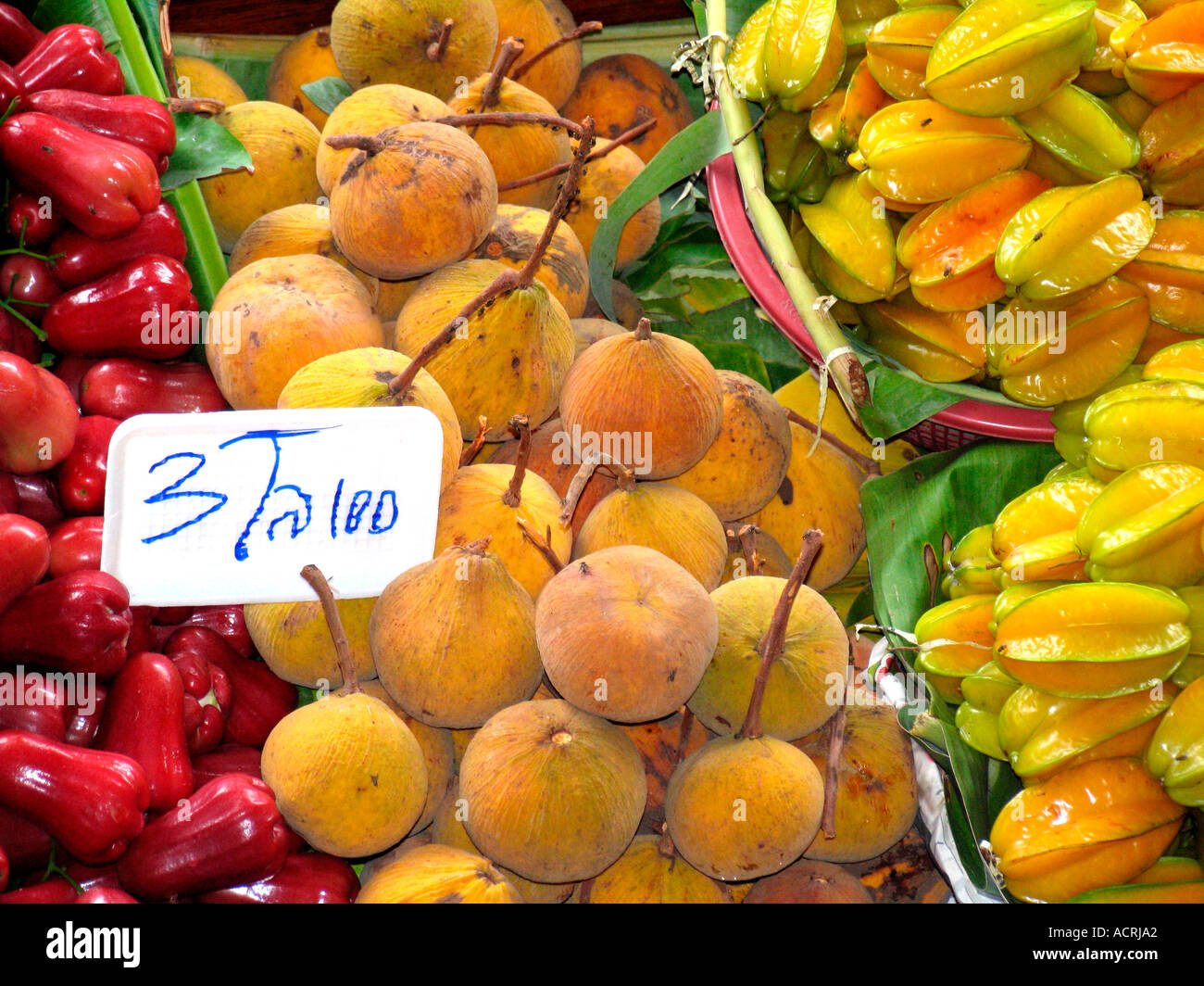 Marché flottant de Damnoen Saduak attraction touristique près de Bangkok en Thaïlande Banque D'Images