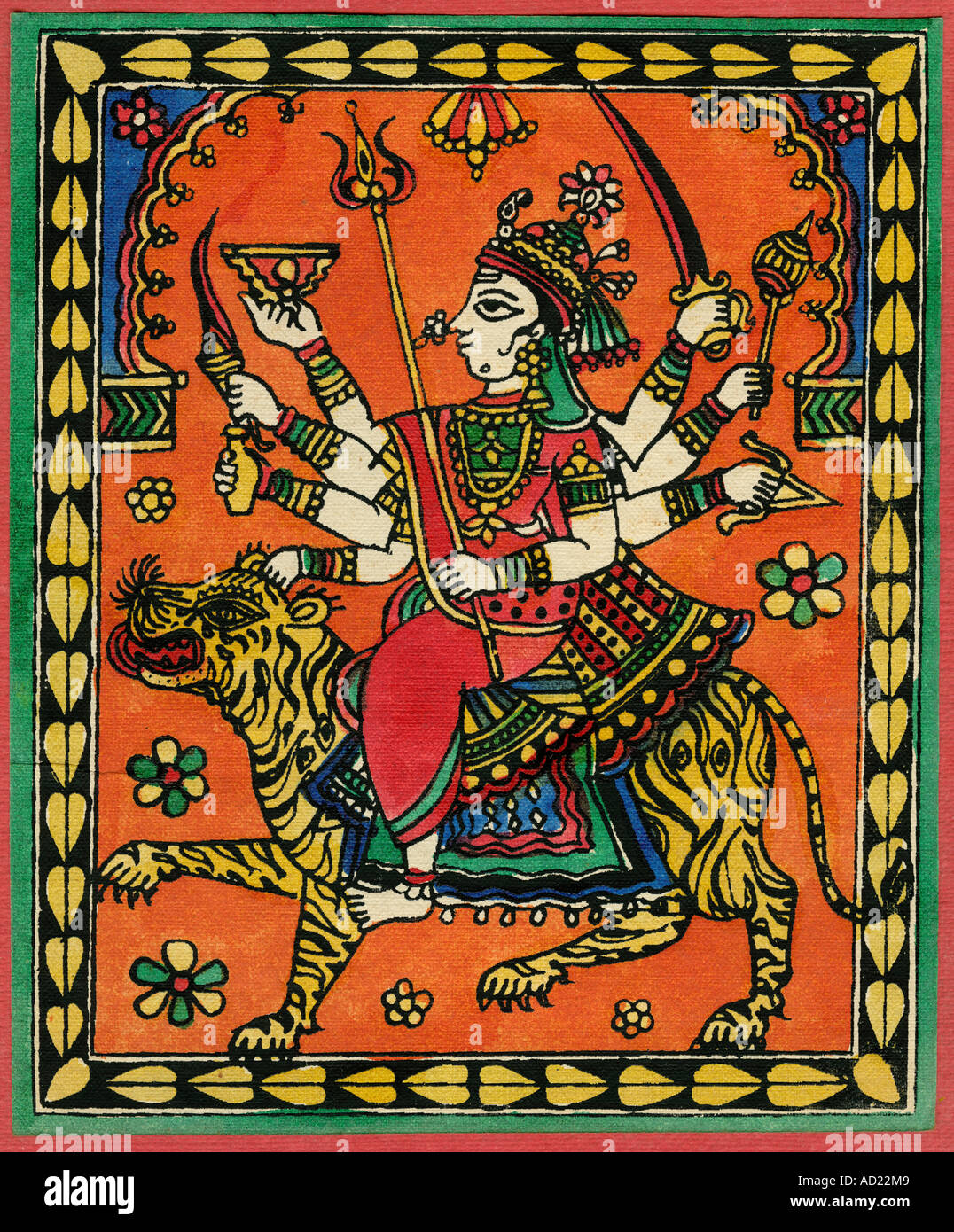 L'art populaire indien du Rajasthan illustration de la Déesse Durga avec huit mains tenant un sabre assis sur tiger peinture sur tissu, Inde Banque D'Images