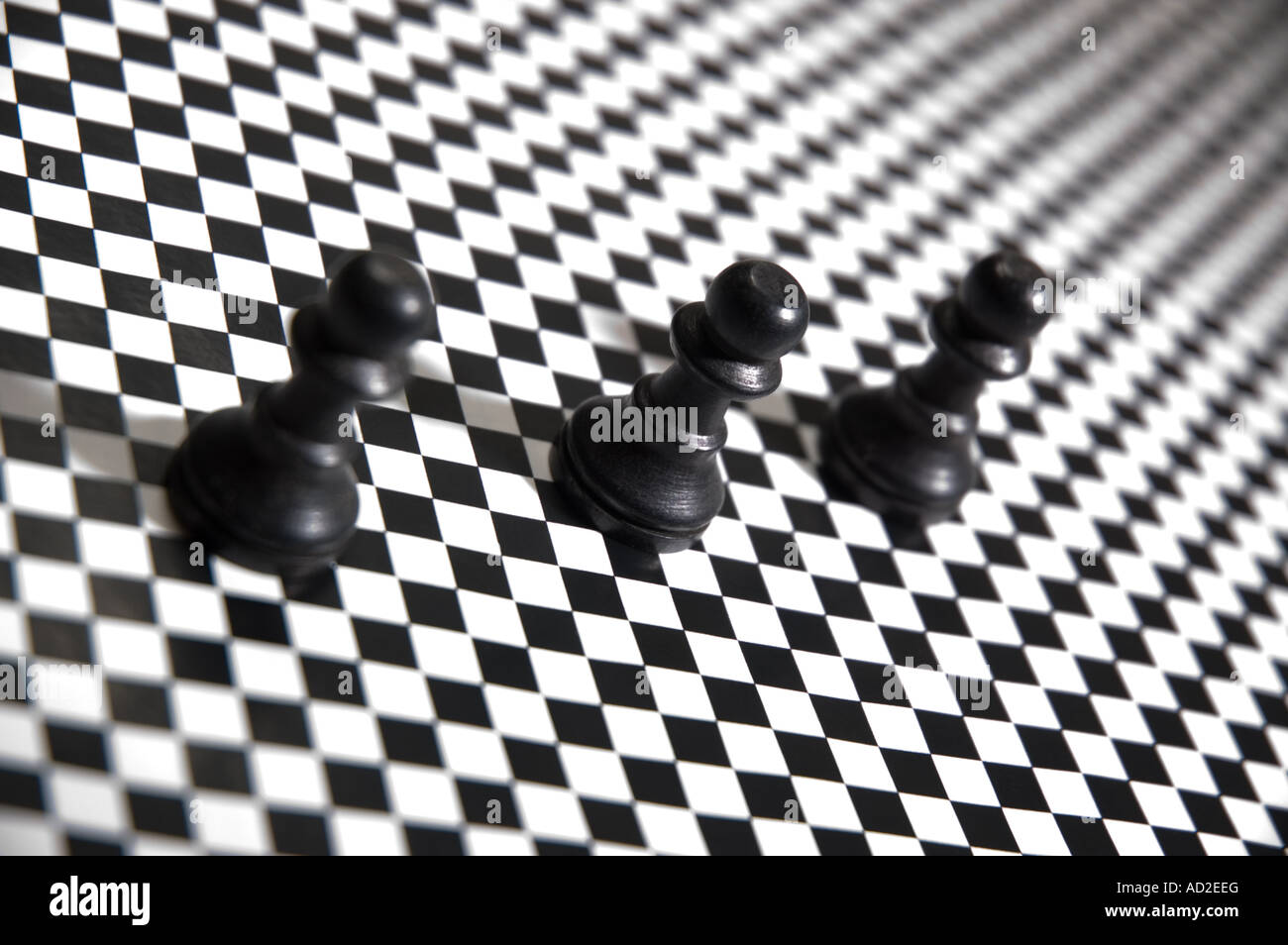 Des pions sur un damier pattern Banque D'Images