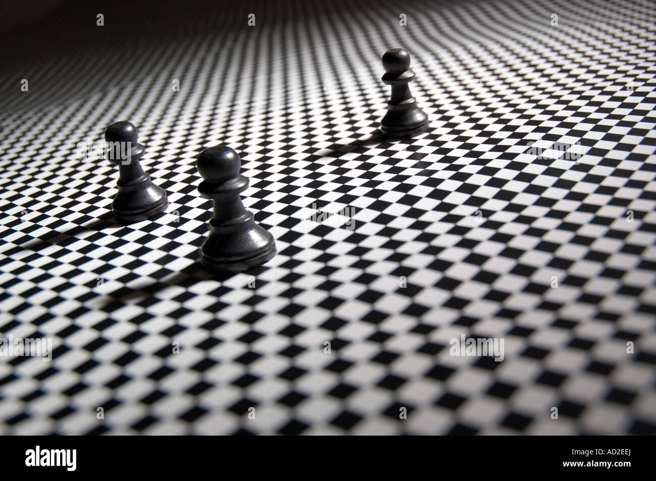 Des pions sur un damier pattern Banque D'Images