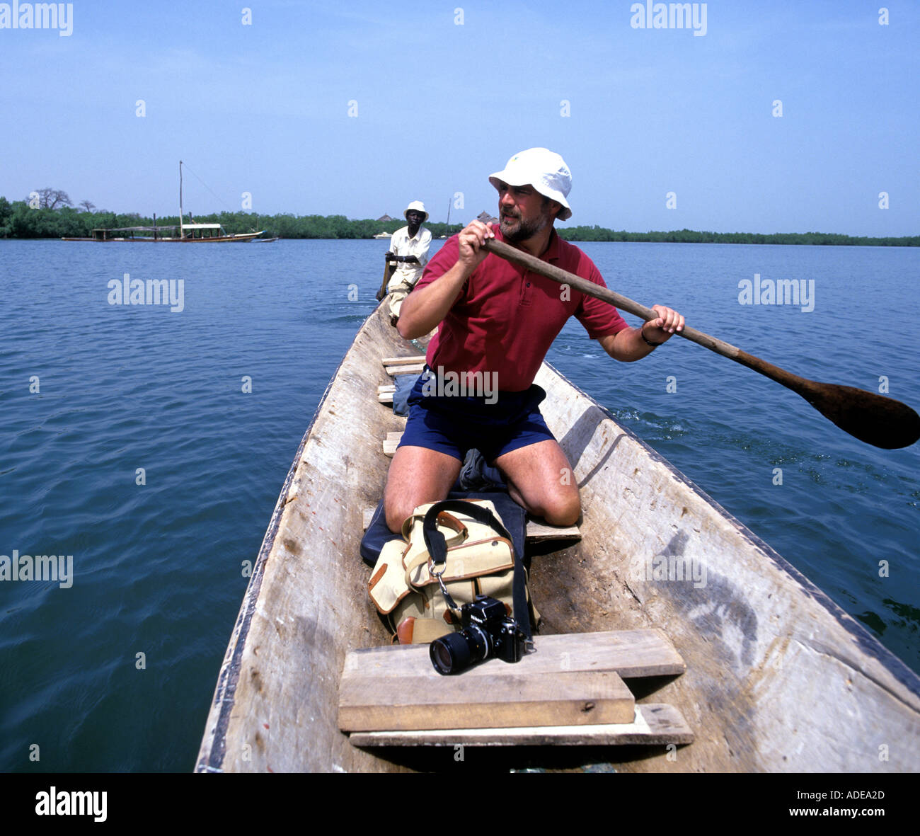 Photographe de voyage dans un bateau Banque D'Images