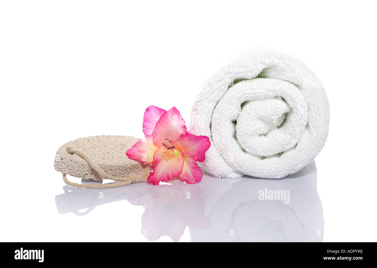Gladiola serviette et pierre ponce pour la santé spa massage Banque D'Images