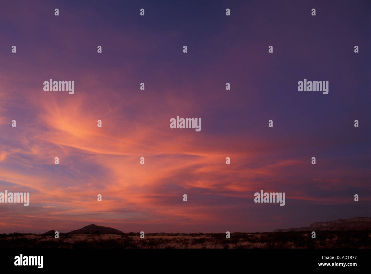 Coucher de soleil sur le parc historique du Hueco Tanks près d'El Paso, au Texas. Banque D'Images