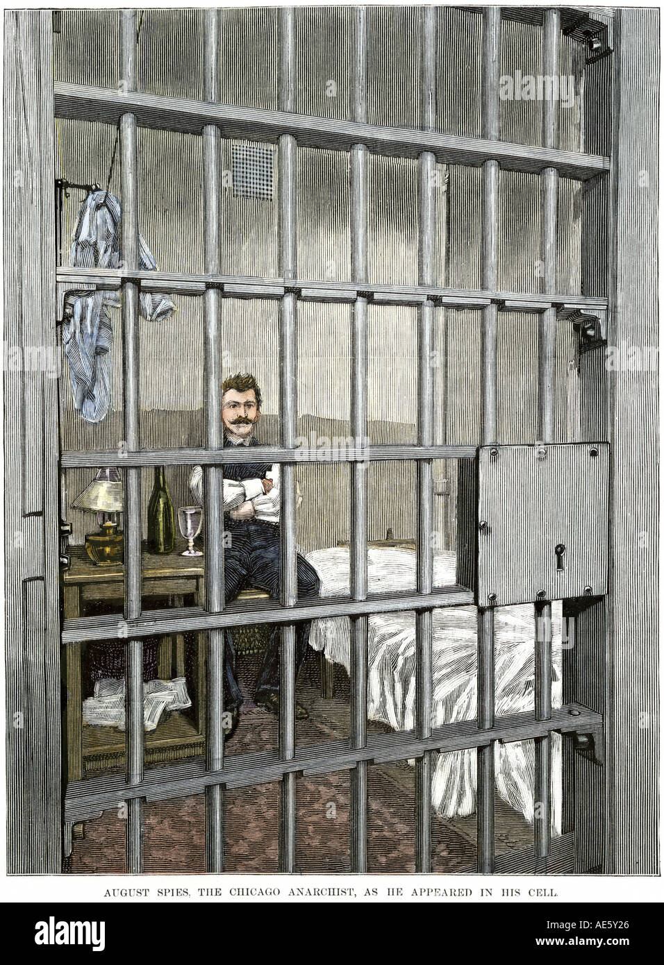 August Spies l'anarchiste de Chicago dans sa cellule après l'émeute de Haymarket en 1887. À la main, gravure sur bois Banque D'Images