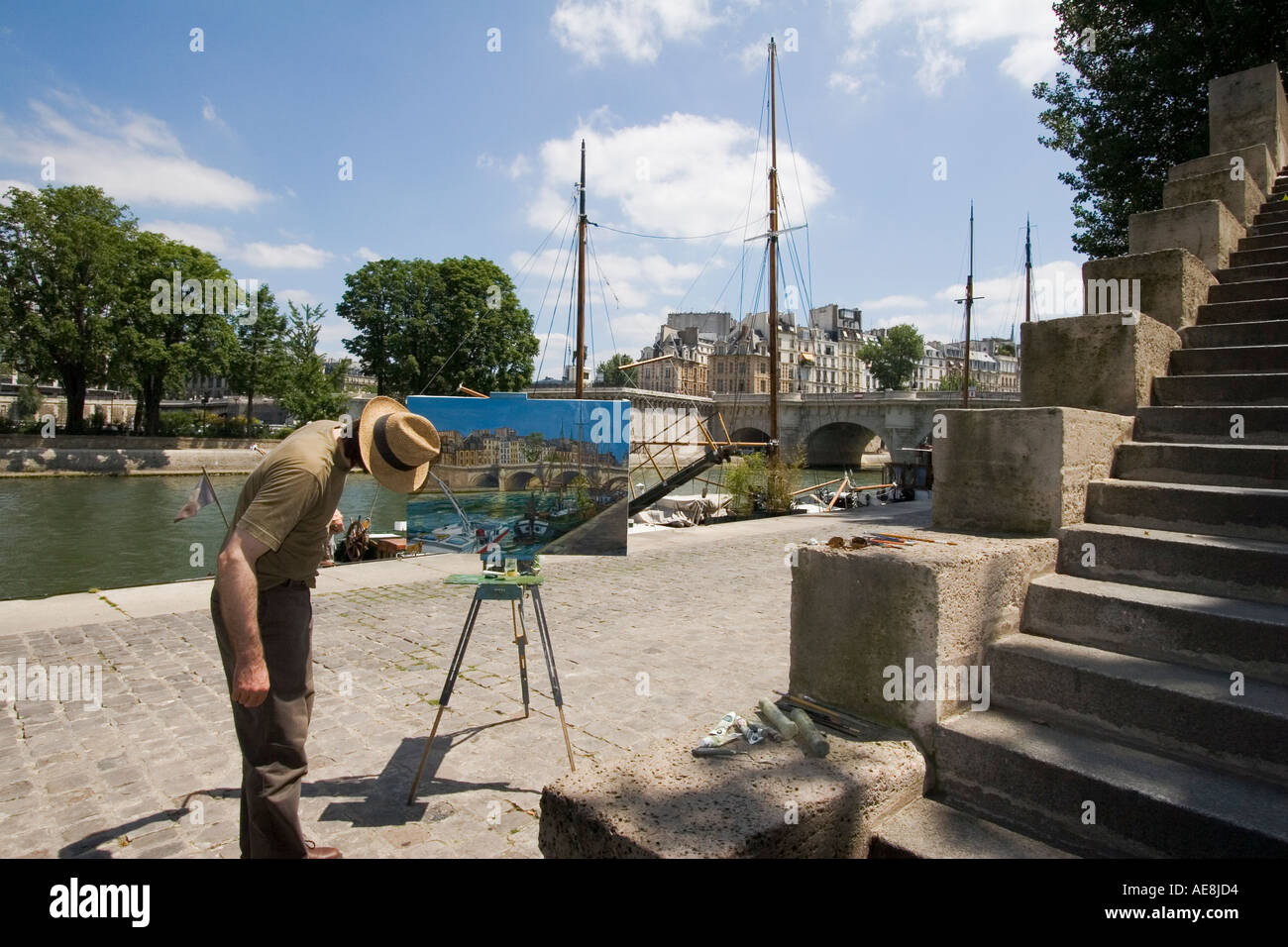 La peinture de l'artiste sur la rive gauche de la Seine près de Pont Neuf Paris France Banque D'Images