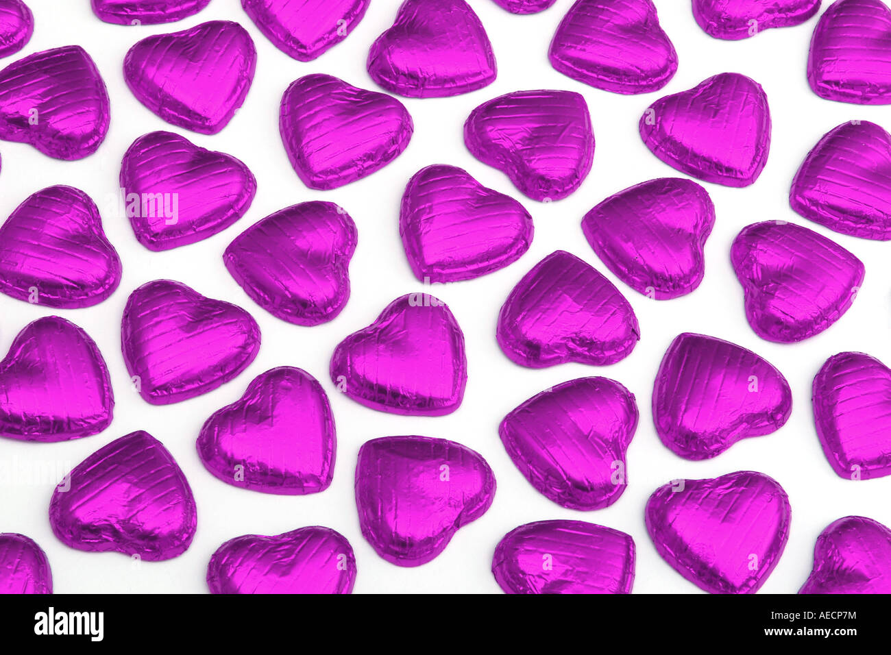 De nombreux coeurs chocolat violet Banque D'Images