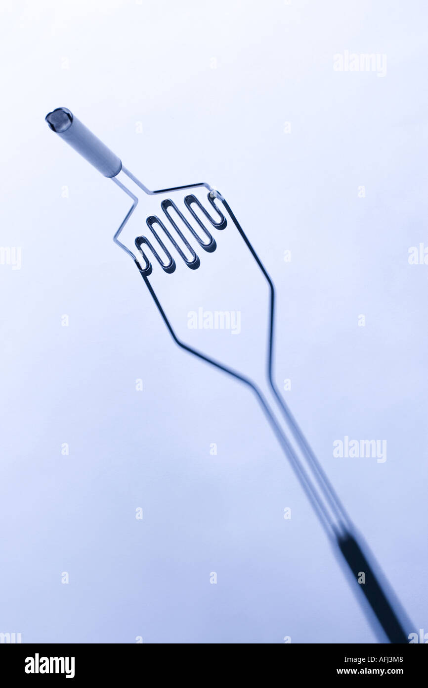 Presse purée en acier inoxydable Banque D'Images