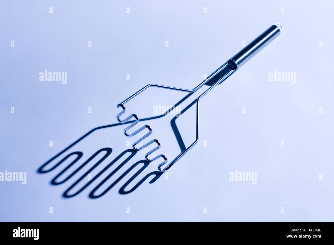 Pilon à pommes de terre studio résumé en acier inoxydable Banque D'Images